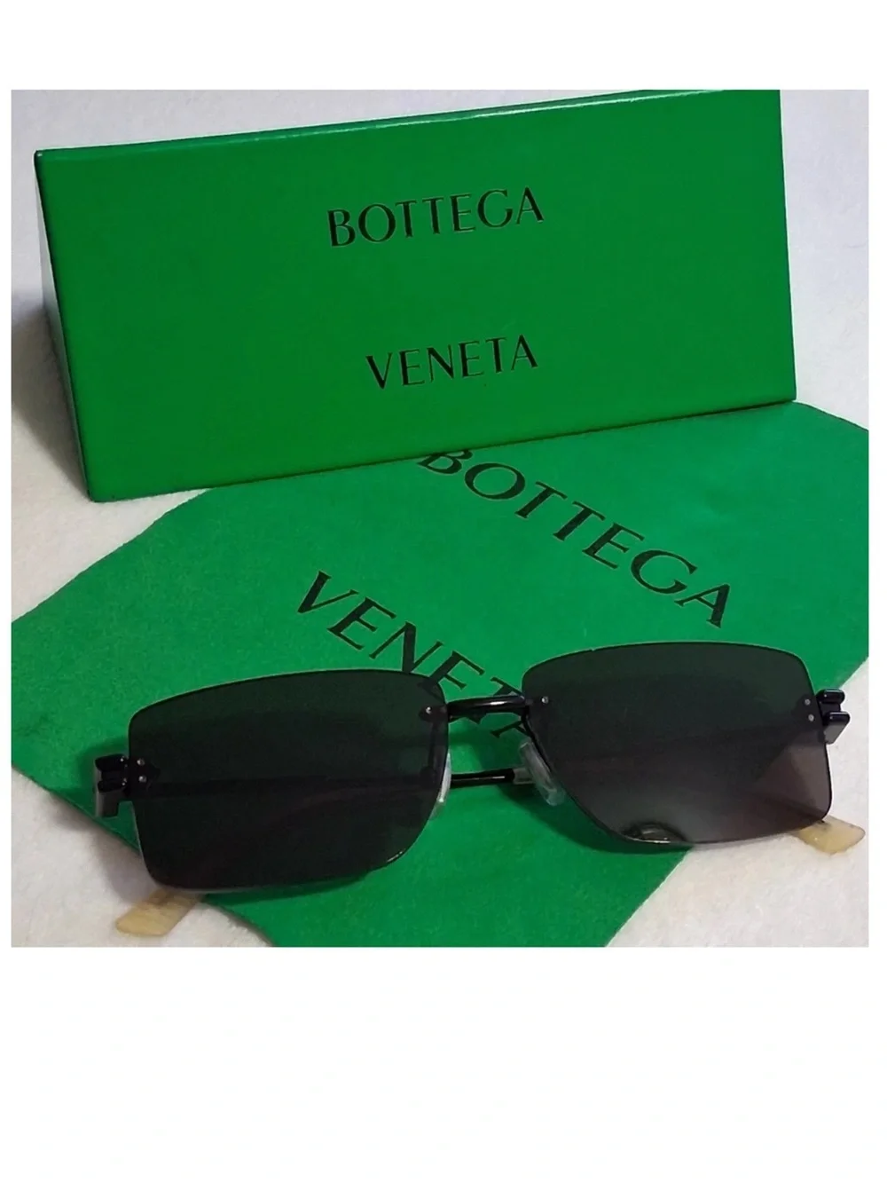 Bottega Veneta Rimless Sunglasses with Dark Smoke Lenses and Black. Perfect cond